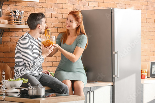 Happy young couple sharing ...