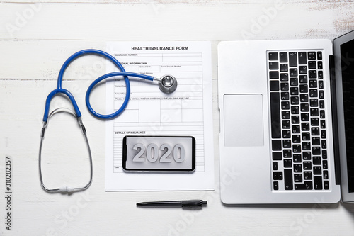 Laptop, stethoscope, mobile...