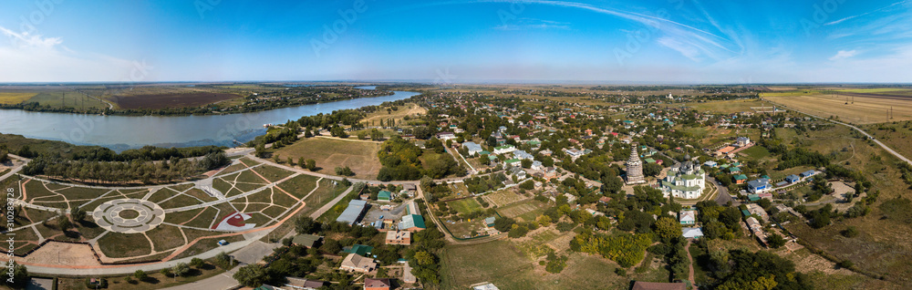 a large aerial panorama of the city of Starocherkassk on a sunny summer day from the discharge side - the old capital of the Don Cossacks in the steppe near the Don River