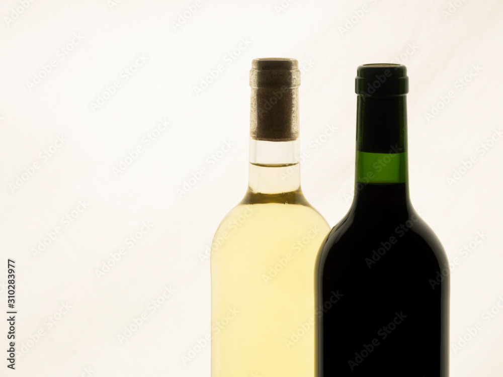 Close up of two bottles of wine unlabelled Close up of two bottles of wine unlabelled