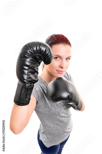 Top down view of a beautiful young woman with boxing gloves © Mendelex