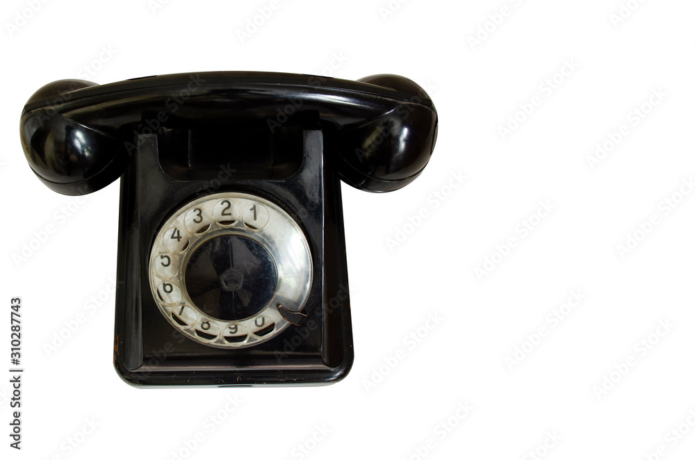Old Soviet black phone closeup isolated on white background.