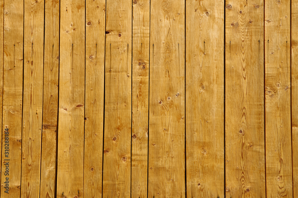 Yellow wooden plank for background or texture Yellow wooden plank for background or texture