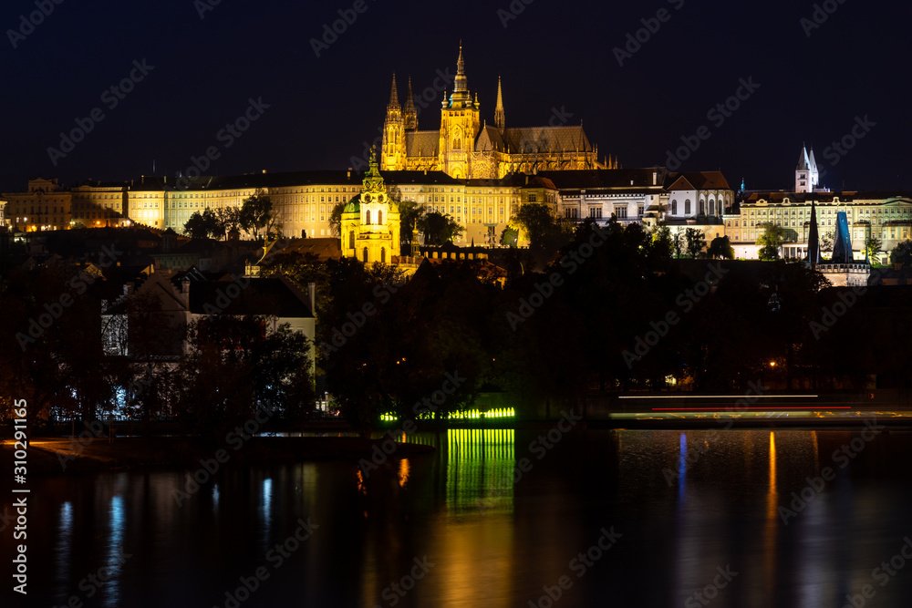 View on Prague castle at night from water