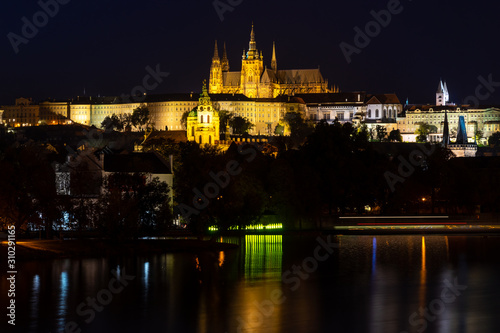 View on Prague castle at night from water