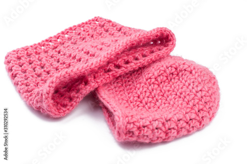 Pink woolen hat isolated on white background.Copy space