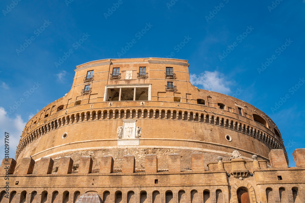 Castel Sant'Angelo in Rome, on the banks of the Tiber River near the arched bridge