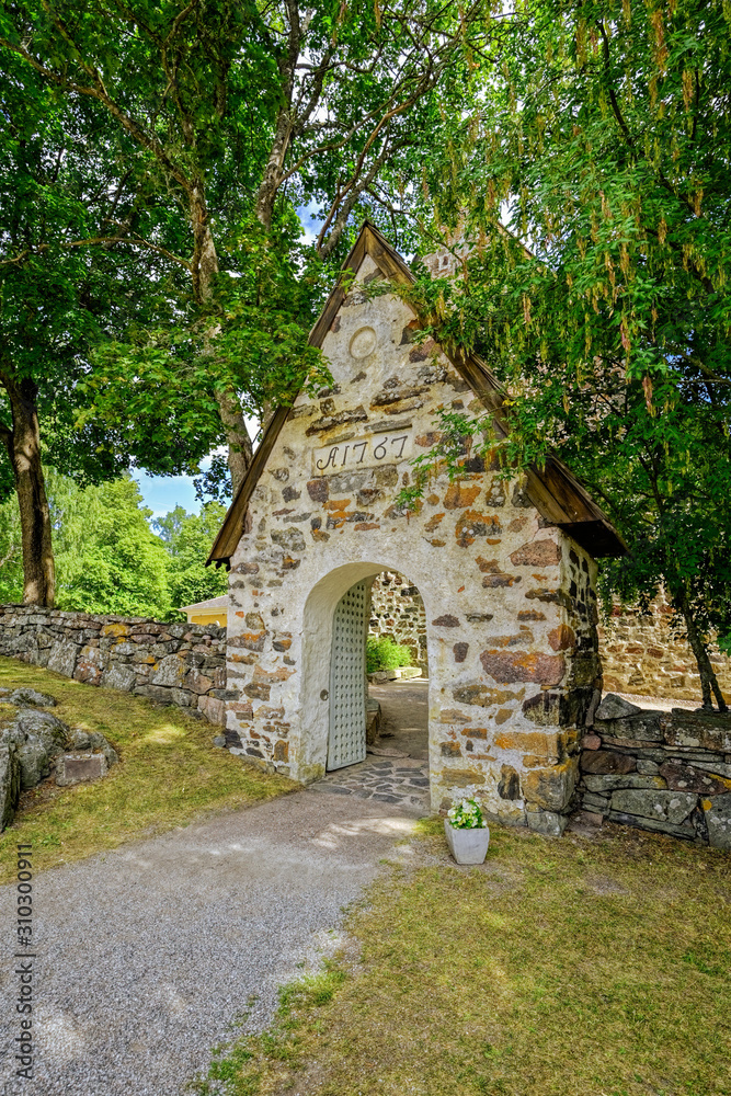 A medieval stone Nauvo Church (Nagu kyrka) from the middle of the 15th century stands on Storlandet Island, Turku Archipelago, Finland.