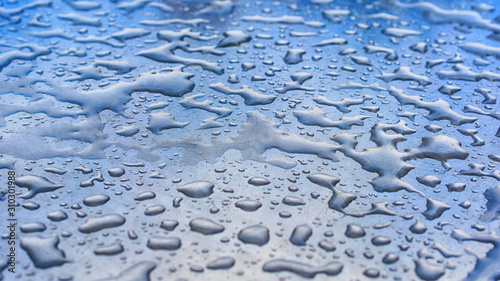 water drops on smooth surface in perspective, macro