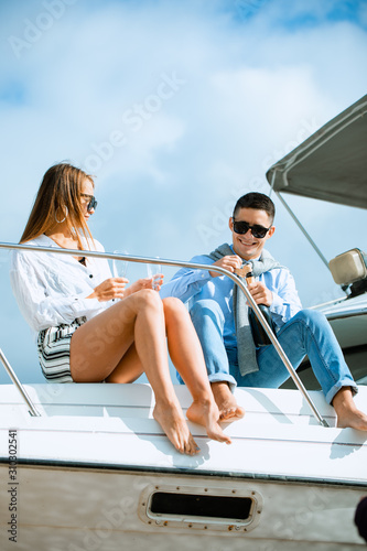 Two young tourists having fun on boat tour in the summertime © Air_Lady
