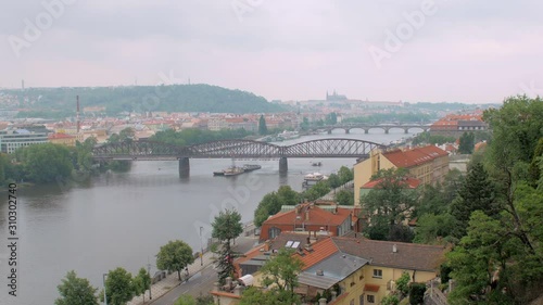 beautiful view of Prague in cloudy weather from hill photo