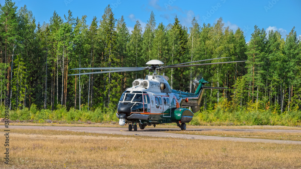 Airbus Helicopters H215 (formerly Eurocopter AS332 Super Puma) heavy-lift  utility aircraft OH-HVP by Finland's Border Guard taxiing on runway at  Karhula airshow. Stock Photo | Adobe Stock