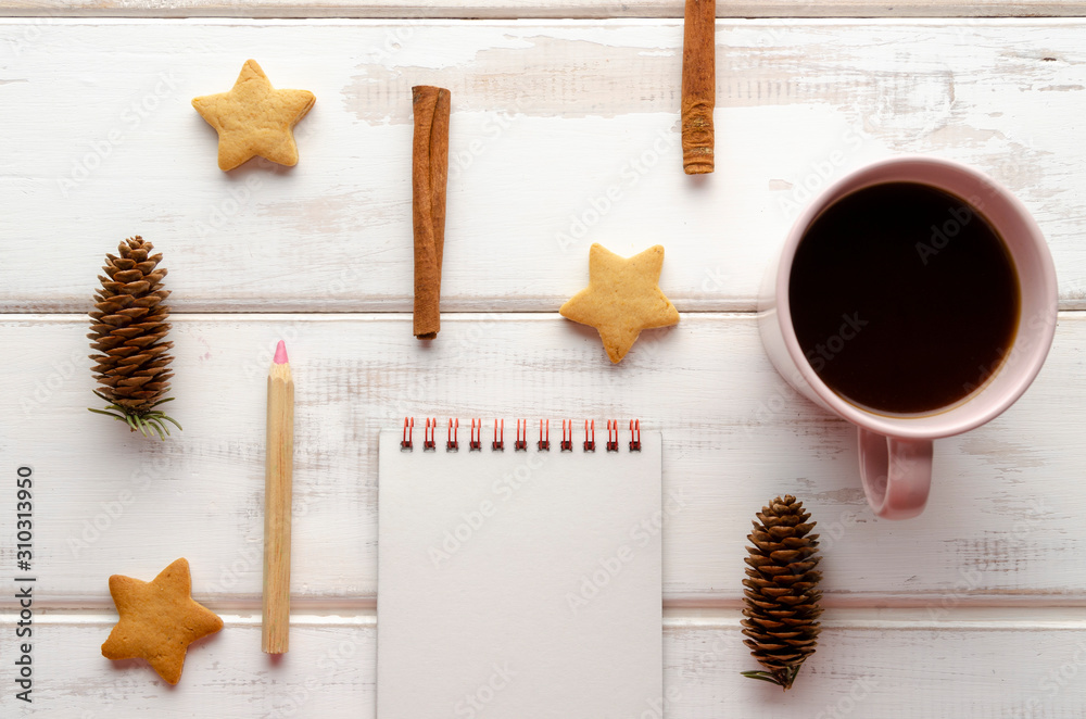 Cup of hot coffee with wish list on table from above, christmas planning concept. Cup of hot coffee with wish list on table from above, christmas planning concept.