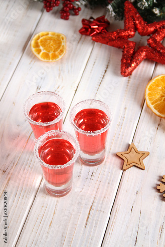 Christmas drink red in glass glasses.