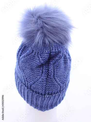 Blue knitted wool hat isolated on white background