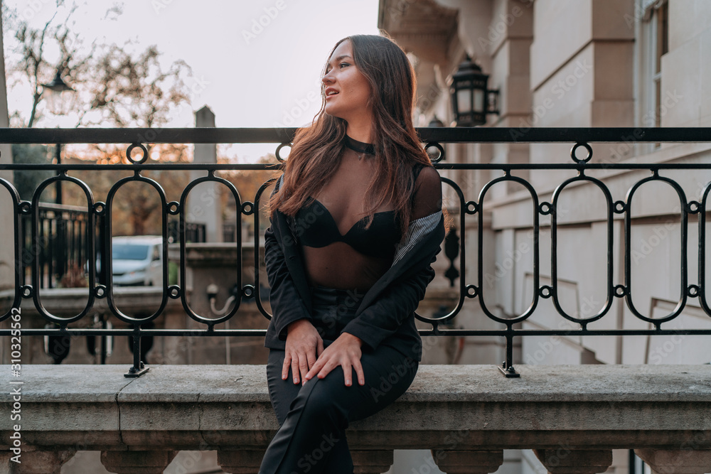 Obraz premium Portrait of Young Brunette Girl with Long Hair, Fashion Street Style