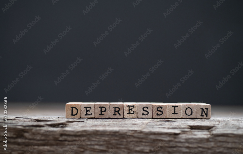 The word depression on a wood background and dark background - obrazy, fototapety, plakaty 