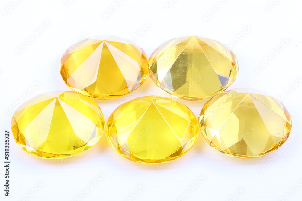 Yellow diamond on a white background