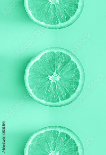 Slice of orange in trendy mint color. Monochrome effect.