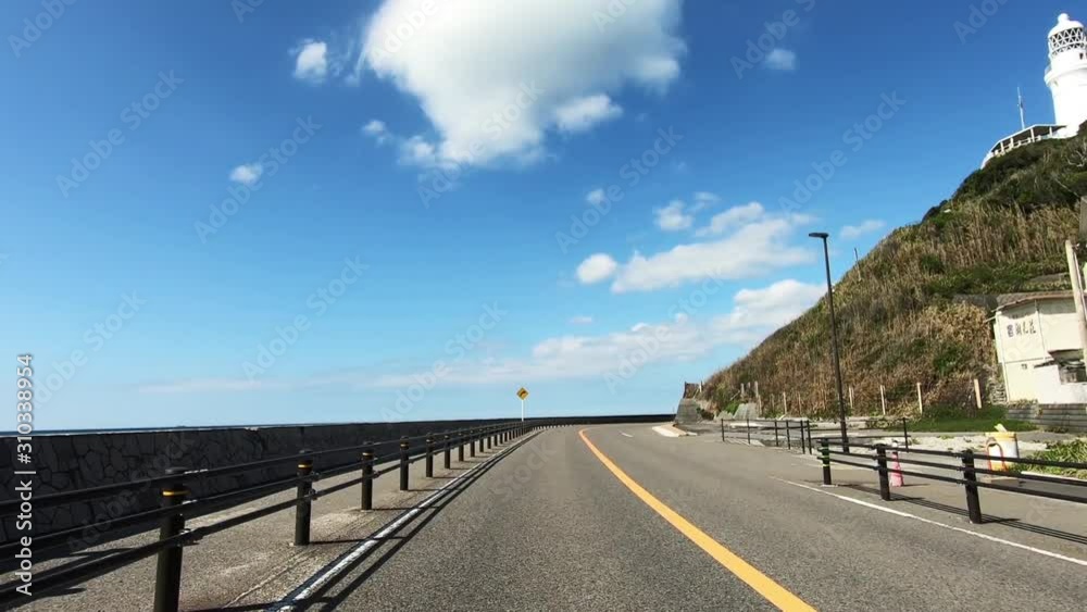 Road with small lighthouse Road with small lighthouse