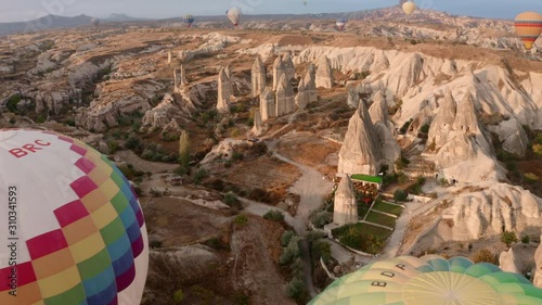 Cappadocia, tourists fly in balloons. Like a frame from a movie