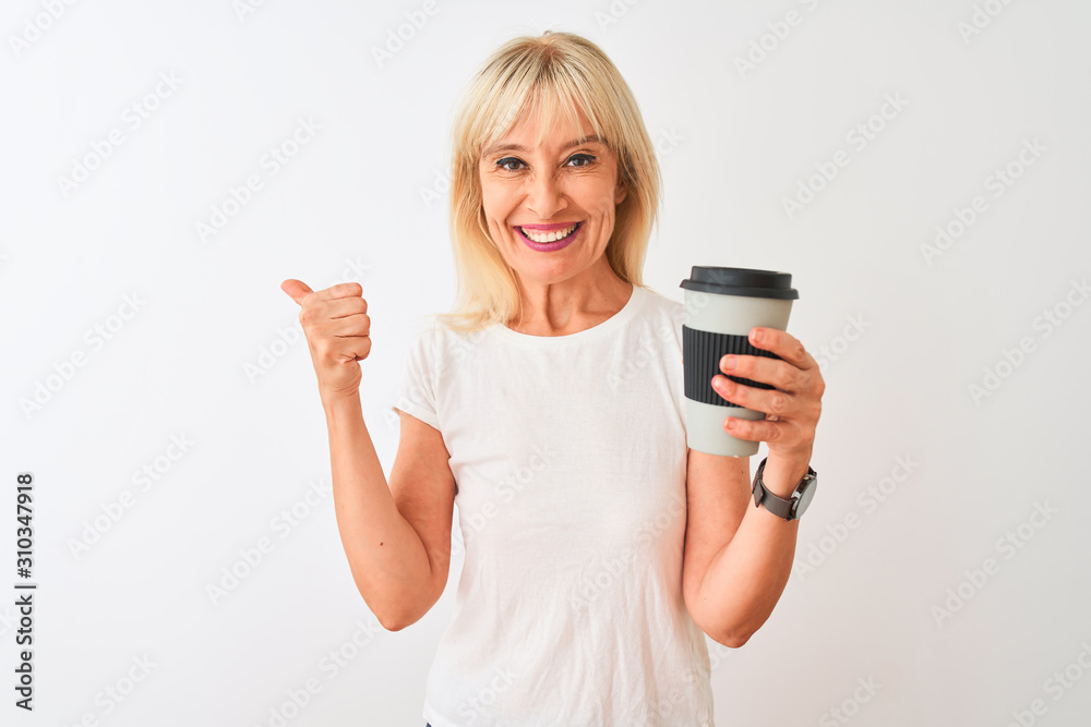 Middle age woman drinking glass of take away coffee standing over isolated white background pointing and showing with thumb up to the side with happy face smiling Middle age woman drinking glass of take away coffee standing over isolated white background pointing and showing with thumb up to the side with happy face smiling