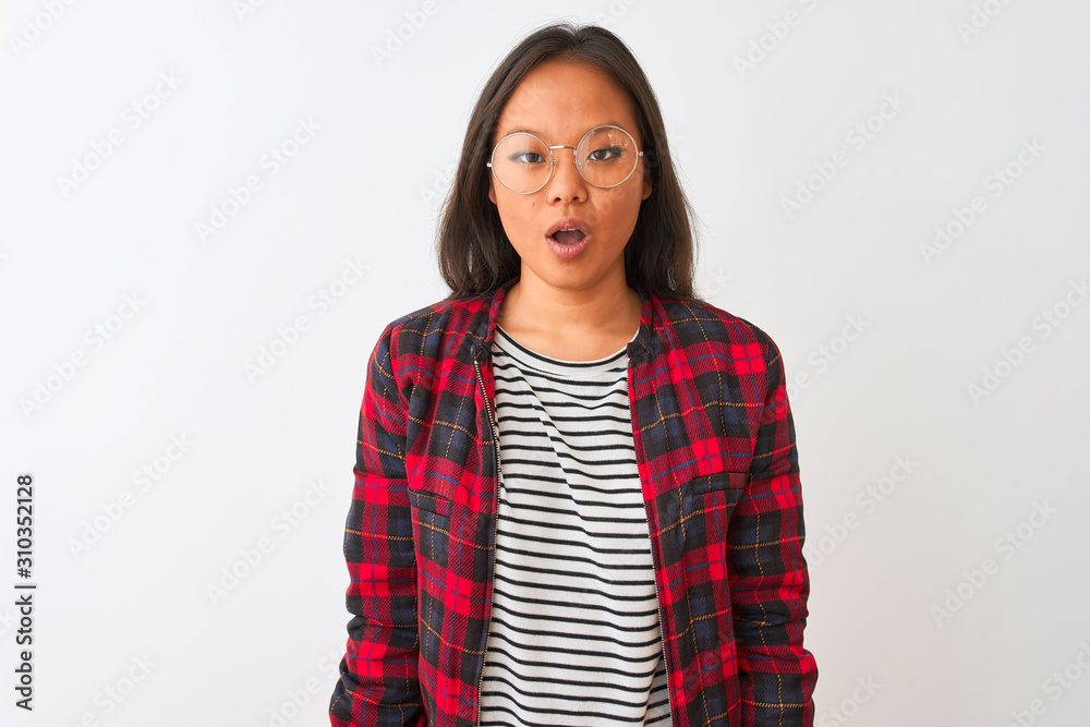 Young chinese woman wearing t-shirt jacket and glasses over isolated white background afraid and shocked with surprise expression, fear and excited face. Young chinese woman wearing t-shirt jacket and glasses over isolated white background afraid and shocked with surprise expression, fear and excited face.