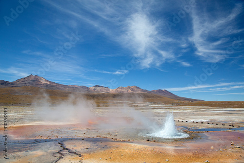 Campo de Geyser El Tatio, Atacama Chile, erupting geyser
