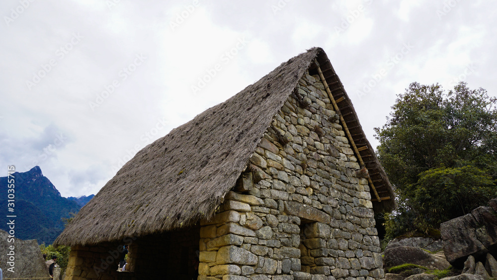 Inca houses, in the city of Machu Picchu