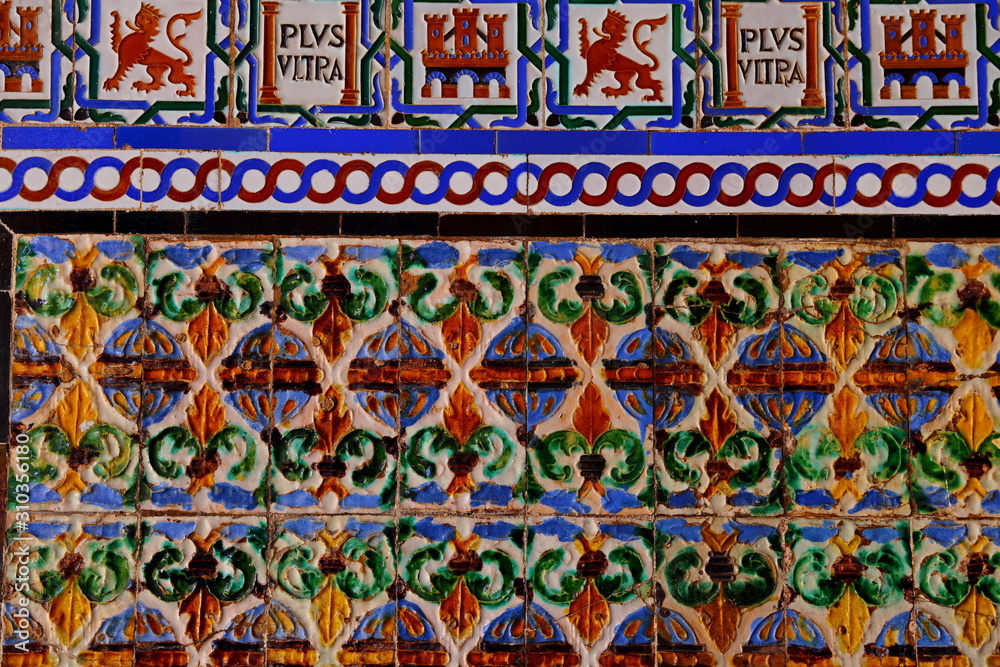 Detail of traditional tiles on facade in Seville Spain