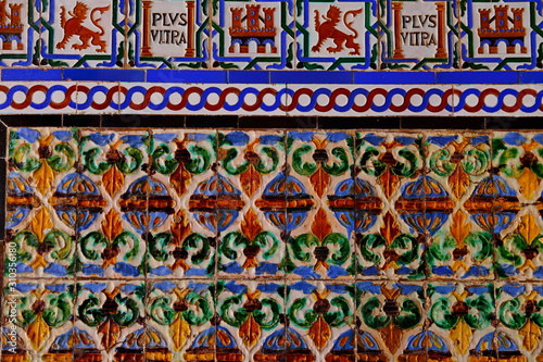 Detail of traditional tiles on facade in Seville Spain
