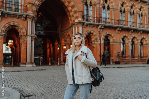 Portrait of Charming Young Blonde Girl, Fashion Street Style