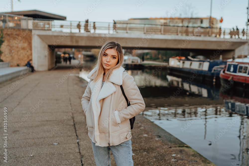 Portrait of Charming Young Blonde Girl, Fashion Street Style