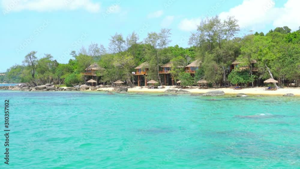 Bungalow at Beach in Rain Forest on Sunny Day Bungalow at Beach in Rain Forest on Sunny Day