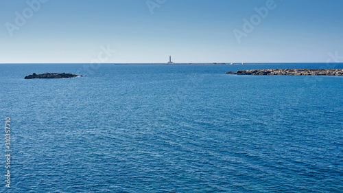View At Isola del Campo (Island of The Field) And It's Lighthouse During a Bright Sunny Day At Gallipoli Puglia Italy © Philippe
