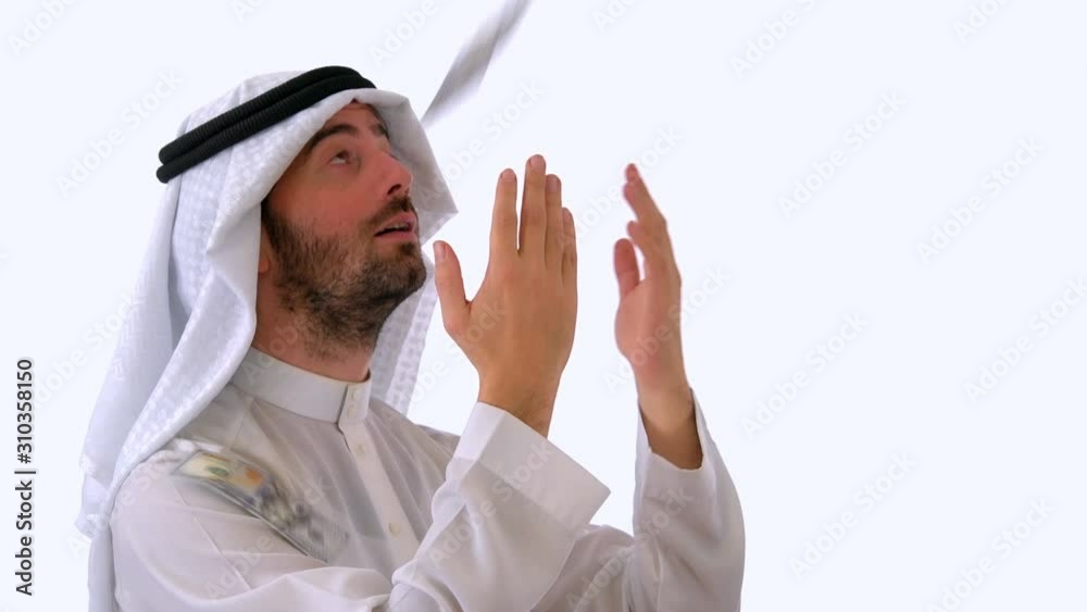 Arabian Man Praying for Money in Isolated White Background Studio Arabian Man Praying for Money in Isolated White Background Studio