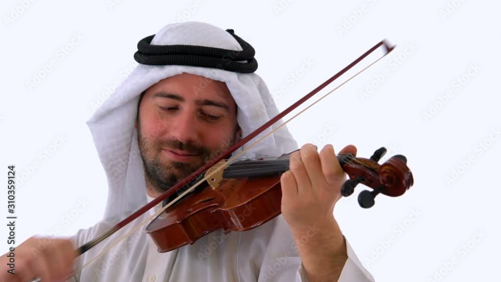 Saudi Arabian Man Playing Violin in Isolated White Background Studio Saudi Arabian Man Playing Violin in Isolated White Background Studio