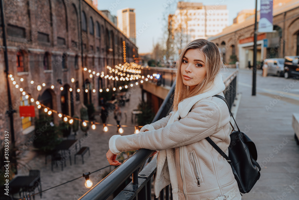 Fototapeta premium Portrait of Charming Young Blonde Girl, Fashion Street Style
