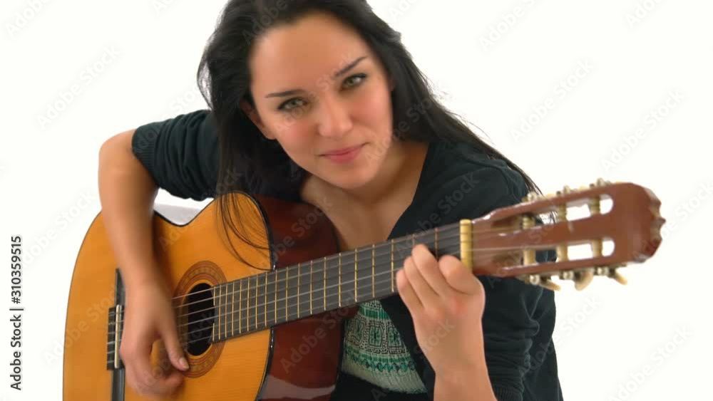 Happy Young Woman Playing Classical Guitar Isolated on White Background Happy Young Woman Playing Classical Guitar Isolated on White Background