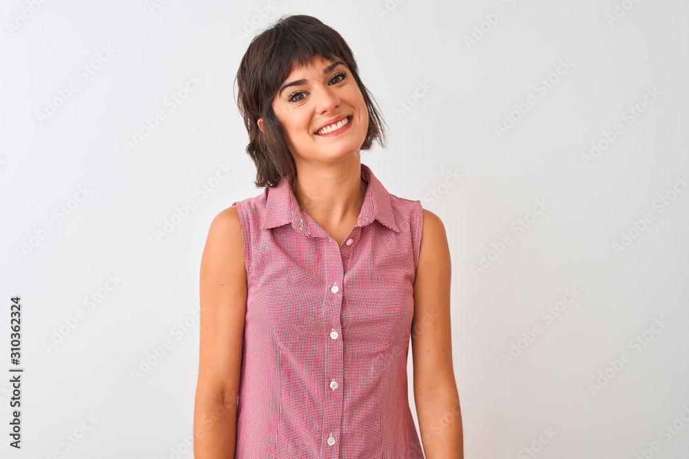 Young beautiful woman wearing red summer shirt standing over isolated white background looking away to side with smile on face, natural expression. Laughing confident. Young beautiful woman wearing red summer shirt standing over isolated white background looking away to side with smile on face, natural expression. Laughing confident.
