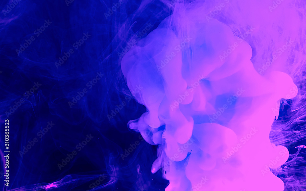 Space phantom blue and purple abstract background. Watercolor ink in water. Cool trending screensaver..