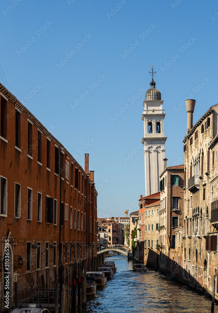 Rio dei Greci canal in Venice with the bell tower of the Church of Saint George 'Dei' Greci'
