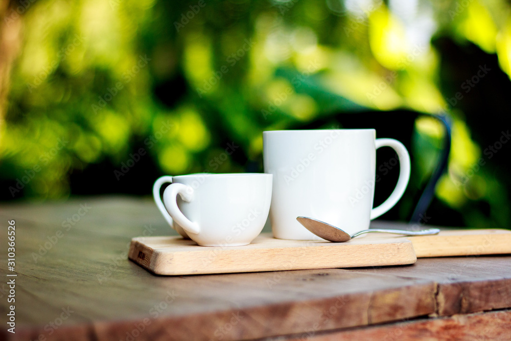 cup of coffee on wooden table