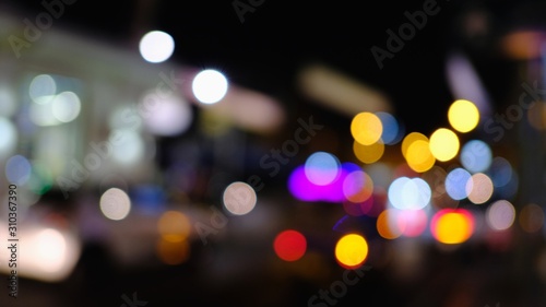 Dark abstract Colorful city Blur background with circular bokeh. space for text. with selective focus © Pachara