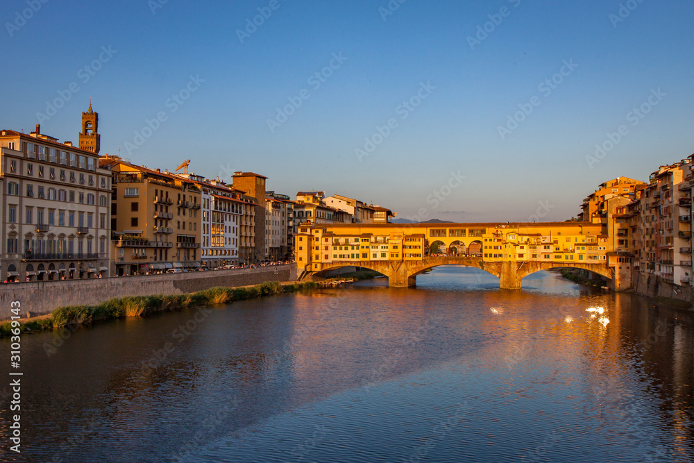 Ponte Vecchio Bridge with Reflection at Sunset in Florence on the Arno River