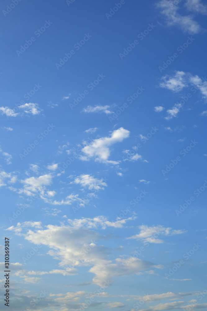 fluffy white cloud moving above clear blue sky in the morning day