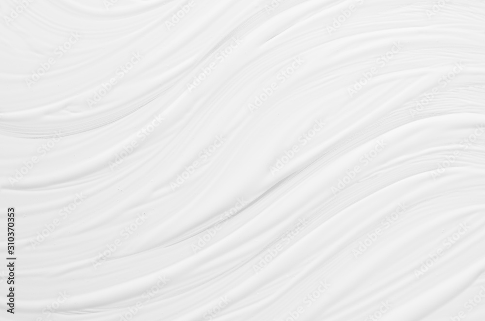 White liquid striped paint texture with smooth diagonal waves as simple abstract background.
