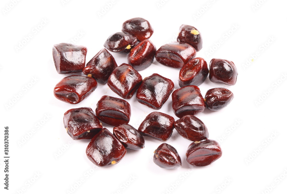 Image of tamarind seeds on a white background. Image of tamarind seeds on a white background.