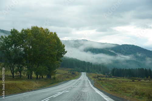 road  highway  landscape  sky  travel  asphalt  nature  clouds  blue  street  country  summer  way  rural  trees  mountain  mountains  green  speed  journey  cloud  tree  empty  line  transportatio