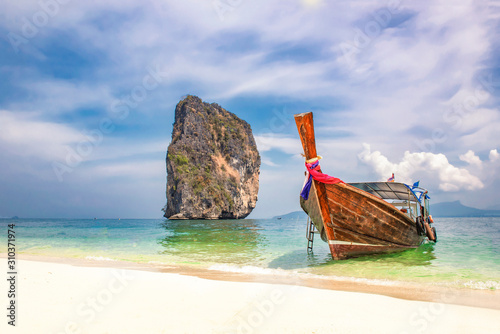 Longtail Tourist Sightseeing Boat on the White Sand Beach of Poda Island in Summer, Krabi, Thailand